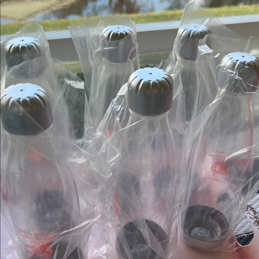 # 0827+ 8 Of Silver and Clear Refilled Plastic Water Bottles - Picture 7 of 15